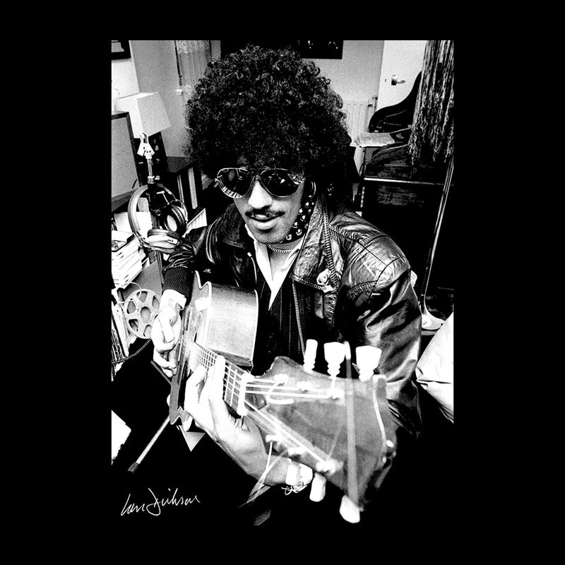 Phil Lynott Of Thin Lizzy Playing Acoustic 1976